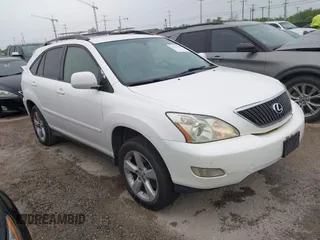2005 Lexus RX 330 with VIN JTJGA31UX50054571, listed as a IAAI auction lot 42193763 with 215,321 mi miles. Bid and sale history available at carsss.com. Image 1.