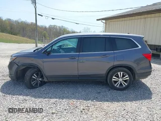 2018 Honda Pilot EX-L with VIN 5FNYF6H52JB066721, listed as a IAAI auction lot 42052842 with 134,393 mi miles and . Bid and sale history available at DreamBid. Image 14.