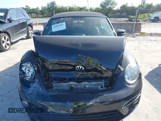 2015 Volkswagen Beetle with VIN 3VW5A7AT7FM811978, listed as a IAAI auction lot 41983986 with 84,421 mi miles and . Bid and sale history available at DreamBid. Image 12.
