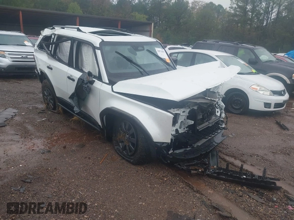 2024 Toyota Land Cruiser z VIN JTEABFAJ9RK004196, wystawiony jako IAAI lot #40875883 z przebiegiem 7 025 mil mil oraz . Historia ofert i sprzedaży dostępna na DreamBid. Obrazek 1.