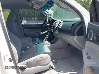 2009 Toyota Tacoma PreRunner with VIN 3TMJU62NX9M091048, listed as a IAAI auction lot 42272791 with 208,257 mi miles and . Bid and sale history available at DreamBid. Image 5.