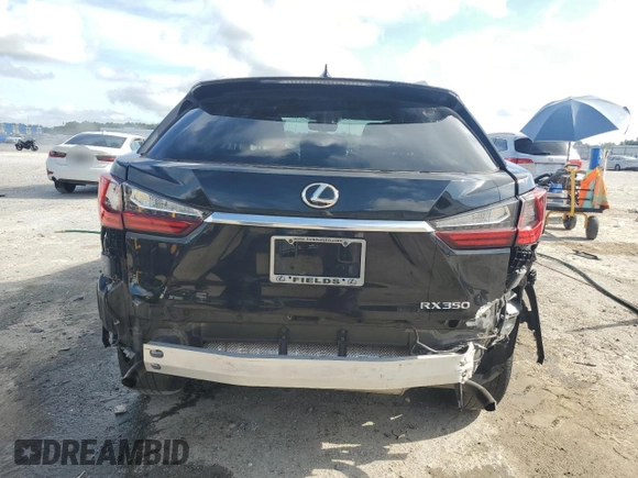 2016 Lexus RX 350 with VIN 2T2ZZMCA2GC008895, listed as a Copart auction lot 60194775 with 127,231 mi miles and Salvage title. Bid and sale history available at DreamBid. Image 6.