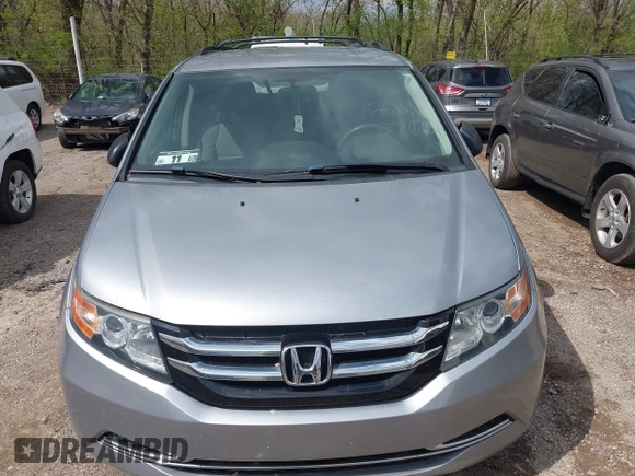 2016 Honda Odyssey LX with VIN 5FNRL5H23GB028338, listed as a IAAI auction lot 41980064 with 186,403 mi miles and . Bid and sale history available at DreamBid. Image 6.