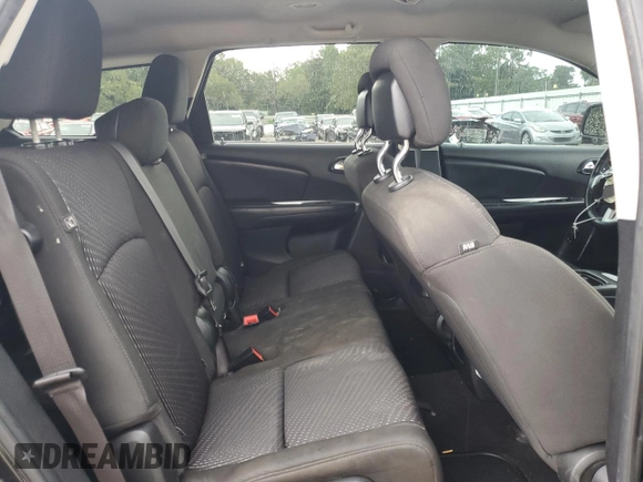 2019 Dodge Journey SE with VIN 3C4PDCBB8KT774151, listed as a Copart auction lot 60909755 with 170,379 mi miles and Salvage title. Bid and sale history available at DreamBid. Image 11.