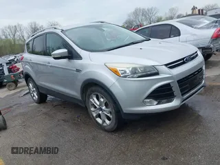 2015 Ford Escape Titanium with VIN 1FMCU9JX2FUA24279, listed as a IAAI auction lot 41930868 with 254,997 mi miles. Bid and sale history available at carsss.com. Image 1.