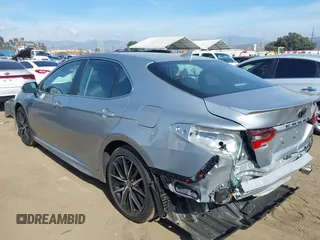 2023 Toyota Camry SE z VIN 4T1T11AK0PU153203, wystawiony jako IAAI lot #38763517 z przebiegiem 11 171 mil mil oraz . Historia ofert i sprzedaży dostępna na DreamBid. Obrazek 3.
