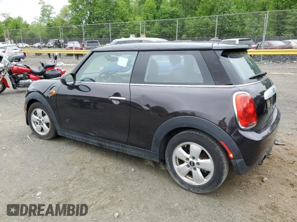 2014 MINI Hardtop with VIN WMWXM5C57ET932920, listed as a Copart auction lot 55810575 with 73,151 mi miles and Salvage title. Bid and sale history available at DreamBid. Image 2.