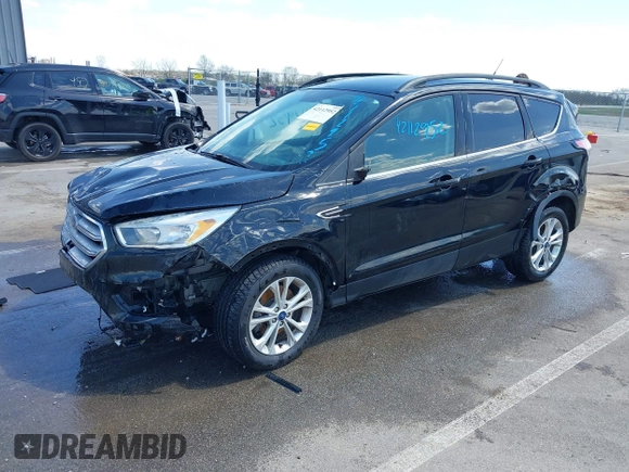 2018 Ford Escape SE z VIN 1FMCU9GD1JUD48846, wystawiony jako IAAI lot #42112952 z przebiegiem 117 580 mil mil oraz . Historia ofert i sprzedaży dostępna na DreamBid. Obrazek 17.