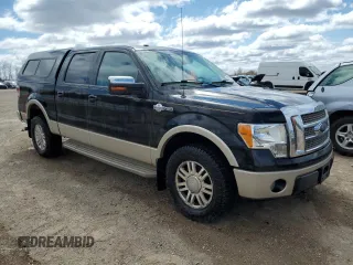 2010 Ford F-150 XL with VIN 1FTFW1EVXAKE36346, listed as a Copart auction lot 52574855 with 187,635 mi miles and Salvage Title. Bid and sale history available at DreamBid. Image 4.