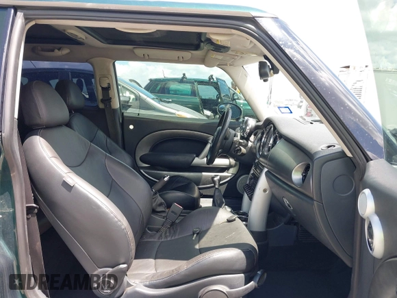 2005 MINI Hardtop S with VIN WMWRE33465TD95560, listed as a IAAI auction lot 42609791 with 133,997 mi miles and . Bid and sale history available at DreamBid. Image 5.