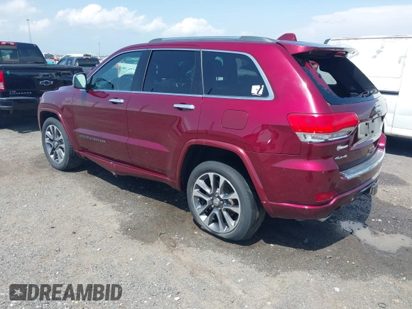 2017 Jeep Grand Cherokee Overland with VIN 1C4RJFCG7HC658943, listed as a IAAI auction lot 42282213 with 103,291 mi miles and . Bid and sale history available at DreamBid. Image 3.