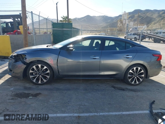 2018 Nissan Maxima Platinum z VIN 1N4AA6AP7JC392710, wystawiony jako IAAI lot #41866951 z przebiegiem 49 026 mil mil oraz . Historia ofert i sprzedaży dostępna na DreamBid. Obrazek 14.