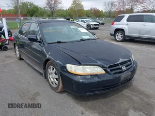 2002 Honda Accord SE z VIN 1HGCG66812A084949, wystawiony jako IAAI lot #42081536 z przebiegiem 309 920 mil mil oraz . Historia ofert i sprzedaży dostępna na DreamBid. Obrazek 6.