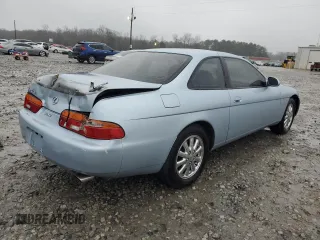 1995 Lexus SC 400 z VIN JT8UZ30CXS0039926, wystawiony jako Copart lot #89373825 z przebiegiem 252 843 mil mil oraz Szkody całkowita. Historia ofert i sprzedaży dostępna na DreamBid. Obrazek 3.