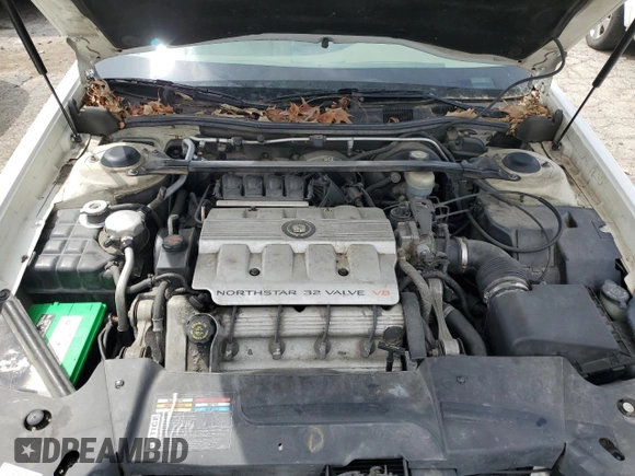 1999 Cadillac DeVille z VIN 1G6KD54Y7XU801251, wystawiony jako Copart lot #52819854 z przebiegiem 180 871 mil mil oraz Szkoda całkowita • Salvage title. Historia ofert i sprzedaży dostępna na DreamBid. Obrazek 11.