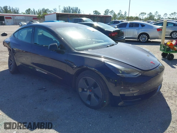 2023 Tesla Model 3 with VIN 5YJ3E1EAXPF623403, listed as a IAAI auction lot 41829543 with 29,414 mi miles and . Bid and sale history available at carsss.com. Image 1.