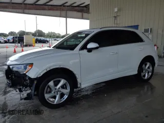 2020 Audi Q3 Premium with VIN WA1AECF3XL1044315, listed as a Copart auction lot 50711005 with 52,691 mi miles and Salvage Title. Bid and sale history available at carsss.com. Image 1.