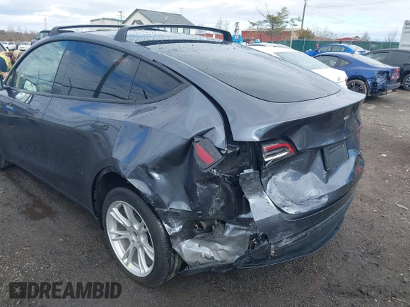 2023 Tesla Model Y Long Range with VIN 7SAYGDEE8PF599254, listed as a IAAI auction lot 41718342 with 24,339 mi miles and . Bid and sale history available at carsss.com. Image 6.