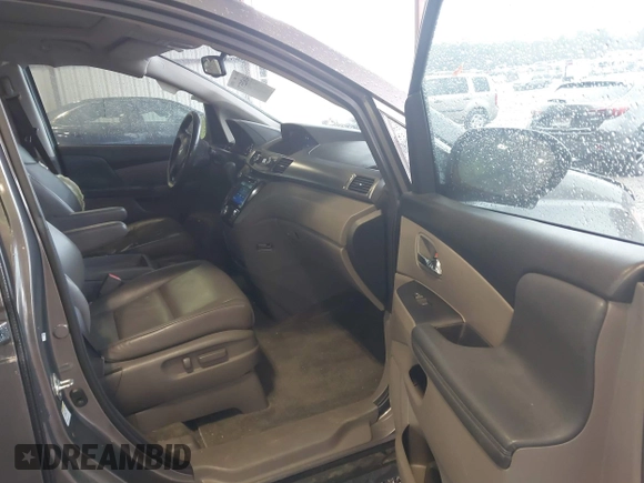 2014 Honda Odyssey EX-L with VIN 5FNRL5H6XEB060090, listed as a IAAI auction lot 41625571 with 112,762 mi miles and . Bid and sale history available at carsss.com. Image 5.