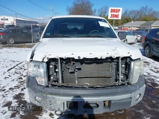 2014 Ford F-150 XL with VIN 1FTFW1EF5EFA45595, listed as a IAAI auction lot 41535410 with 124,208 mi miles. Bid and sale history available at carsss.com. Image 12.
