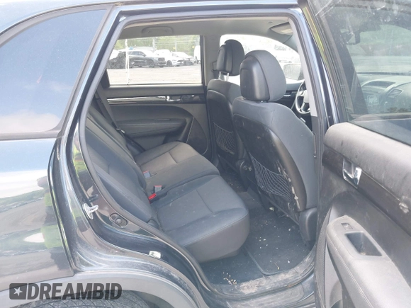 2013 Kia Sorento LX with VIN 5XYKTCA60DG403769, listed as a IAAI auction lot 42265980 with 215,013 mi miles and . Bid and sale history available at DreamBid. Image 8.