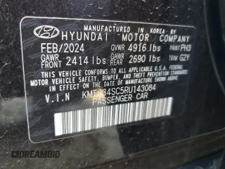 2024 Genesis G70 2.5T with VIN KMTG34SC5RU143084, listed as a Copart auction lot 49413075 with 12,447 mi miles and Clean title. Bid and sale history available at DreamBid. Image 12.