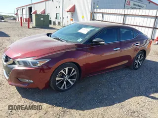2016 Nissan Maxima Platinum z VIN 1N4AA6AP1GC416590, wystawiony jako IAAI lot #41817288 z przebiegiem 248 514 mil mil oraz . Historia ofert i sprzedaży dostępna na DreamBid. Obrazek 23.