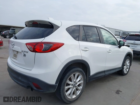 2013 Mazda CX-5 Grand Touring with VIN JM3KE2DEXD0166115, listed as a IAAI auction lot 41919164 with 102,999 mi miles and . Bid and sale history available at carsss.com. Image 4.