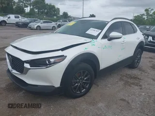 2023 Mazda CX-30 S with VIN 3MVDMBAM1PM511211, listed as a IAAI auction lot 42396707 with 49,469 mi miles and . Bid and sale history available at DreamBid. Image 2.