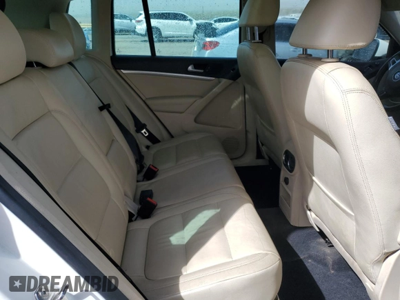 2012 Volkswagen Tiguan SE with VIN WVGAV7AX1CW530016, listed as a Copart auction lot 48551935 with 102,455 mi miles and Salvage Title. Bid and sale history available at DreamBid. Image 11.