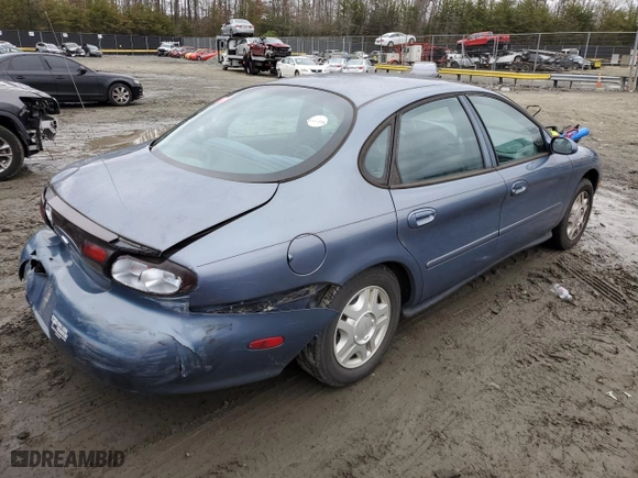 1999 Ford Taurus SE with VIN 1FAFP53U4XG150881, listed as a Copart auction lot 40964564 with 124,928 mi miles and Clean Title. Bid and sale history available at carsss.com. Image 3.