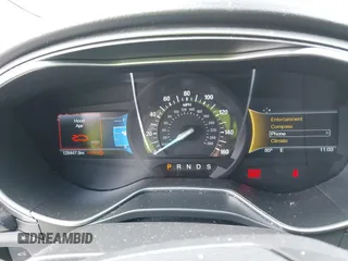 2016 Ford Fusion Titanium with VIN 3FA6P0K96GR400436, listed as a IAAI auction lot 42191256 with 128,447 mi miles and . Bid and sale history available at DreamBid. Image 7.