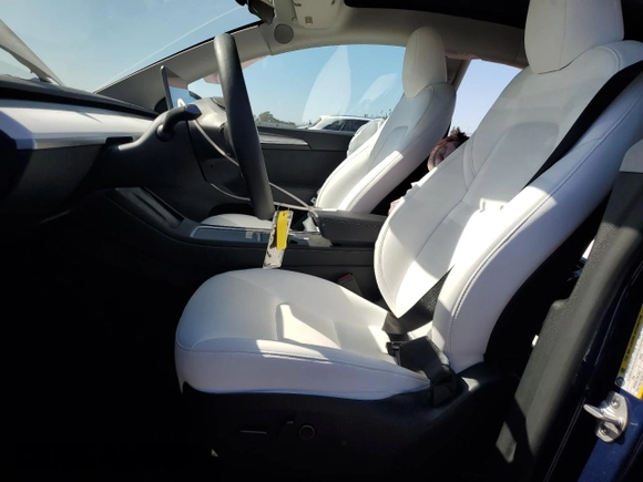 2024 Tesla Model Y Long Range with VIN 7SAYGDEEXRF983989, listed as a Copart auction lot 64035155 with 12,137 mi miles and Salvage title. Bid and sale history available at DreamBid. Image 7.