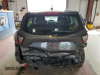2017 Ford Escape S z VIN 1FMCU0F72HUB39102, wystawiony jako Copart lot #63622825 z przebiegiem 120 760 mil mil oraz Szkoda całkowita • Salvage title. Historia ofert i sprzedaży dostępna na DreamBid. Obrazek 6.