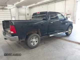 2017 Ram 2500 SLT with VIN 3C6TR5DT5HG691688, listed as a IAAI auction lot 42540295 with 183,613 mi miles and . Bid and sale history available at DreamBid. Image 4.