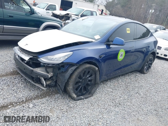 2021 Tesla Model Y Standard Range with VIN 5YJYGDED8MF122985, listed as a IAAI auction lot 41430423 with 120,302 mi miles and . Bid and sale history available at carsss.com. Image 18.