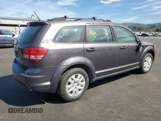 2014 Dodge Journey SE with VIN 3C4PDCABXET308940, listed as a Copart auction lot 52049255 with 119,955 mi miles and Salvage Title. Bid and sale history available at carsss.com. Image 3.