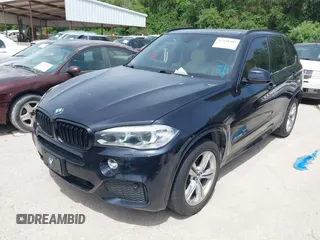 2014 BMW X5 xDrive50i with VIN 5UXKR6C55E0C03743, listed as a IAAI auction lot 42268302 with 118,892 mi miles and . Bid and sale history available at DreamBid. Image 17.