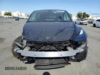 2024 Tesla Model Y Long Range с VIN 7SAYGDEE8RF184146, выставлен на аукционе Copart как лот 61194535 с пробегом 8 225 миль миль и Списание • Salvage title. История ставок и продаж доступна на DreamBid. Изображение 5.