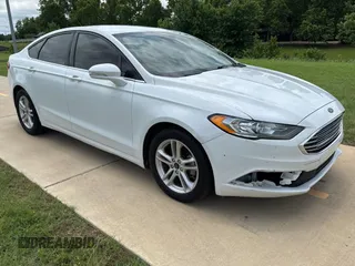 2018 Ford Fusion SE z VIN 3FA6P0H75JR226467, wystawiony jako Copart lot #58990295 z przebiegiem 169 296 mil mil oraz Tytuł czysty. Historia ofert i sprzedaży dostępna na DreamBid. Obrazek 1.