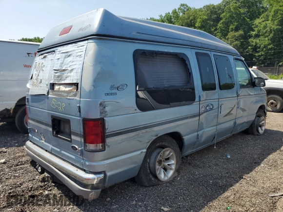 2000 Ford Econoline Cargo Recreational with VIN 1FDRE14L5YHA56690, listed as a Copart auction lot 58926155 with 162,797 mi miles and Salvage title. Bid and sale history available at DreamBid. Image 3.