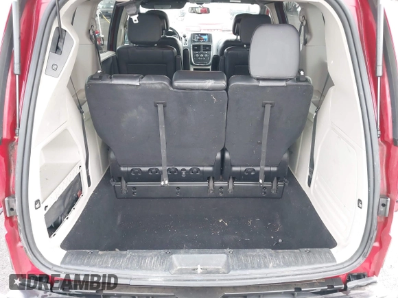 2014 Dodge Grand Caravan SXT with VIN 2C4RDGCG3ER257695, listed as a IAAI auction lot 41534568 with 116,896 mi miles and . Bid and sale history available at DreamBid. Image 21.