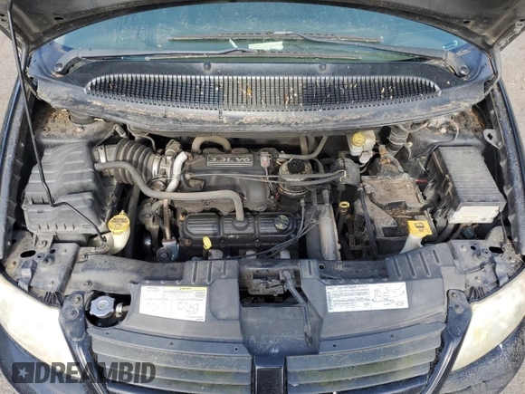 2007 Dodge Caravan SE z VIN 1D4GP25R57B143802, wystawiony jako Copart lot #58398105 z przebiegiem 187 468 mil mil oraz Czysty tytuł • Clean title. Historia ofert i sprzedaży dostępna na DreamBid. Obrazek 12.