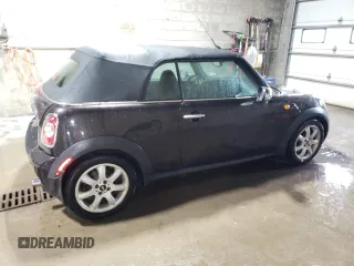 2015 MINI Convertible z VIN WMWZN3C59FT266929, wystawiony jako Copart lot #57264985 z przebiegiem 110 200 mil mil oraz Szkoda całkowita • Salvage title. Historia ofert i sprzedaży dostępna na DreamBid. Obrazek 3.
