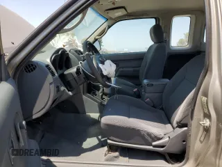 2004 Nissan Frontier XE with VIN 1N6DD26TX4C447116, listed as a Copart auction lot 59432335 with 127,001 mi miles and Salvage title. Bid and sale history available at DreamBid. Image 7.