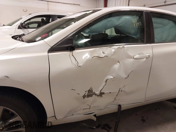 2015 Toyota Camry XLE with VIN 4T1BF1FK0FU083626, listed as a IAAI auction lot 41911558 with 79,640 mi miles and . Bid and sale history available at DreamBid. Image 6.