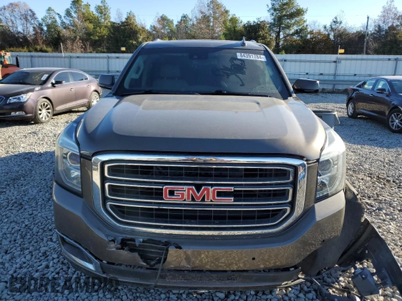 2015 GMC Yukon SLT with VIN 1GKS1BKC8FR664001, listed as a Copart auction lot 84391784 with 0 mi miles and Salvage Title. Bid and sale history available at carsss.com. Image 5.