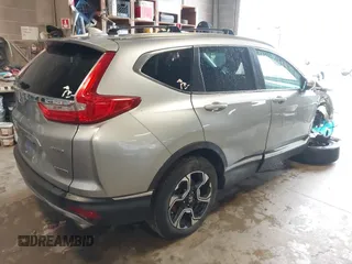 2017 Honda CR-V Touring with VIN 5J6RW2H95HL042012, listed as a IAAI auction lot 41911028 with 93,575 mi miles. Bid and sale history available at carsss.com. Image 4.