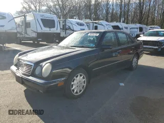1996 Mercedes-Benz E Class with VIN WDBJF20F9TJ023003, listed as a Copart auction lot 86356784 with 230,944 mi miles and Salvage Title. Bid and sale history available at carsss.com. Image 1.