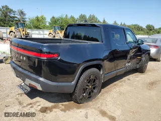 2024 Rivian R1T Adventure Package with VIN 7FCTGAAA3RN033543, listed as a Copart auction lot 65133364 with 0 mi miles and Salvage Title. Bid and sale history available at carsss.com. Image 3.